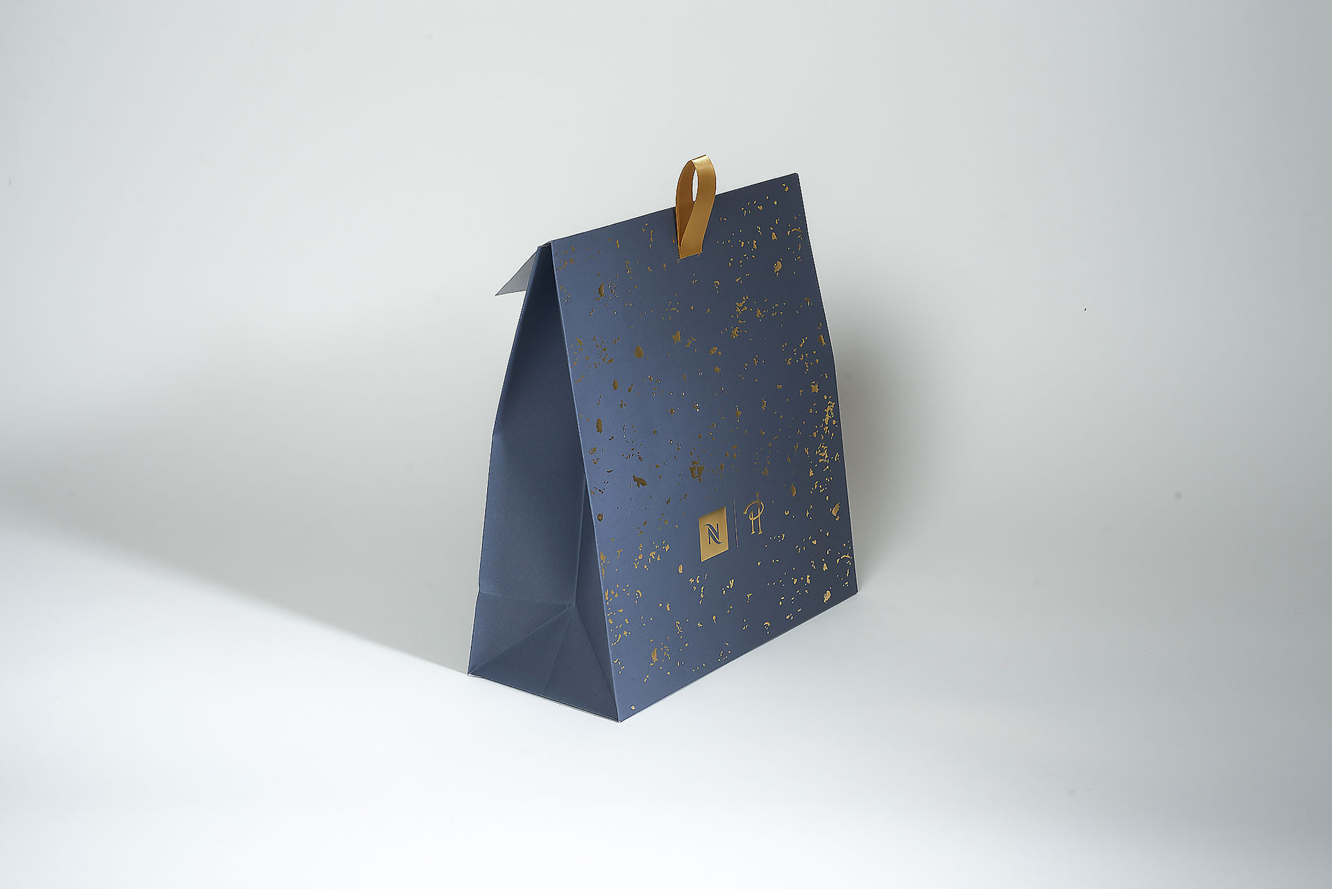 Paper luxury shopping bag Fiorini International for Nespresso